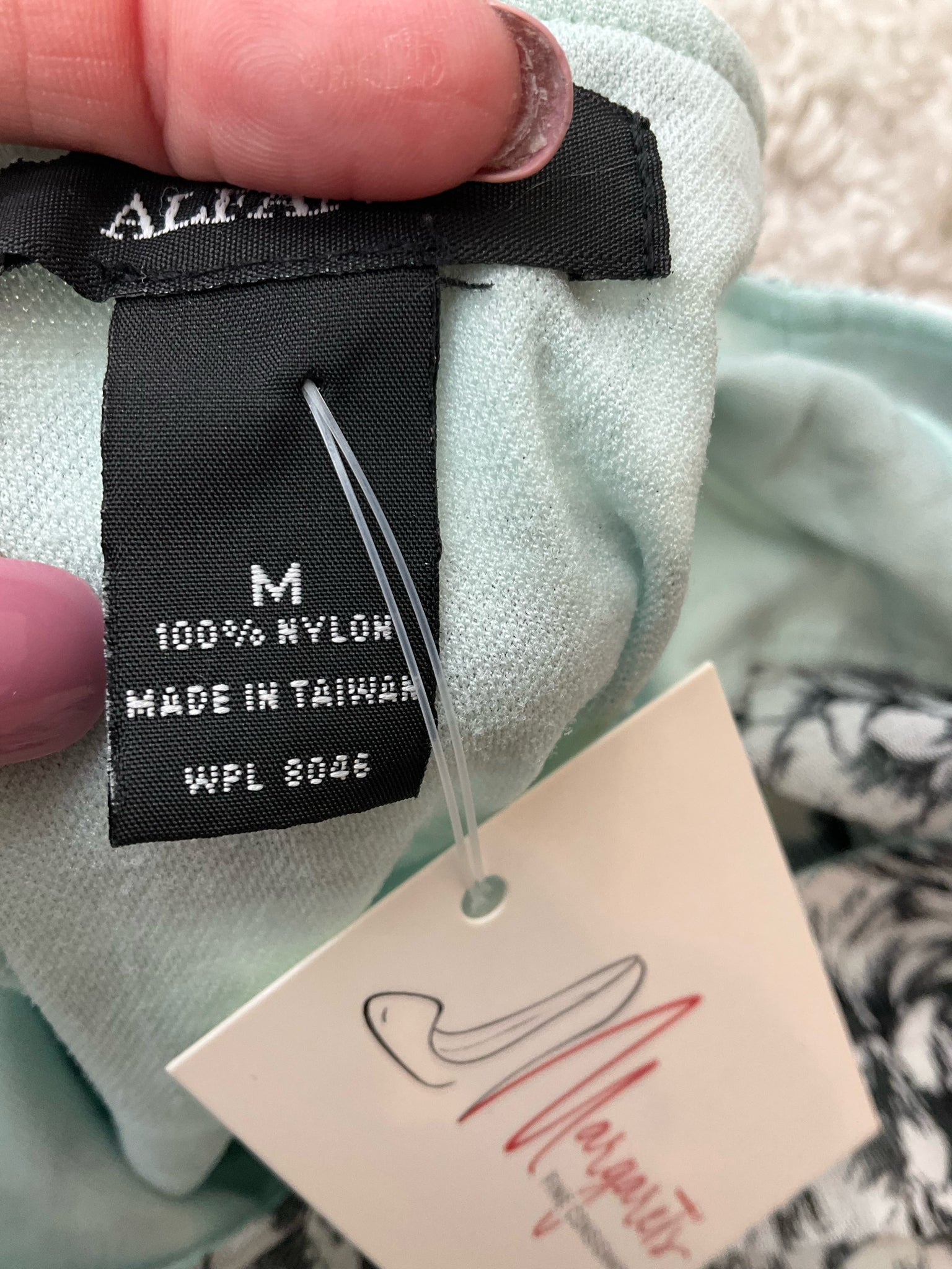 Alfani aqua and black floral blouse, scoop neck, size medium, casual pullover top displayed on a mannequin.