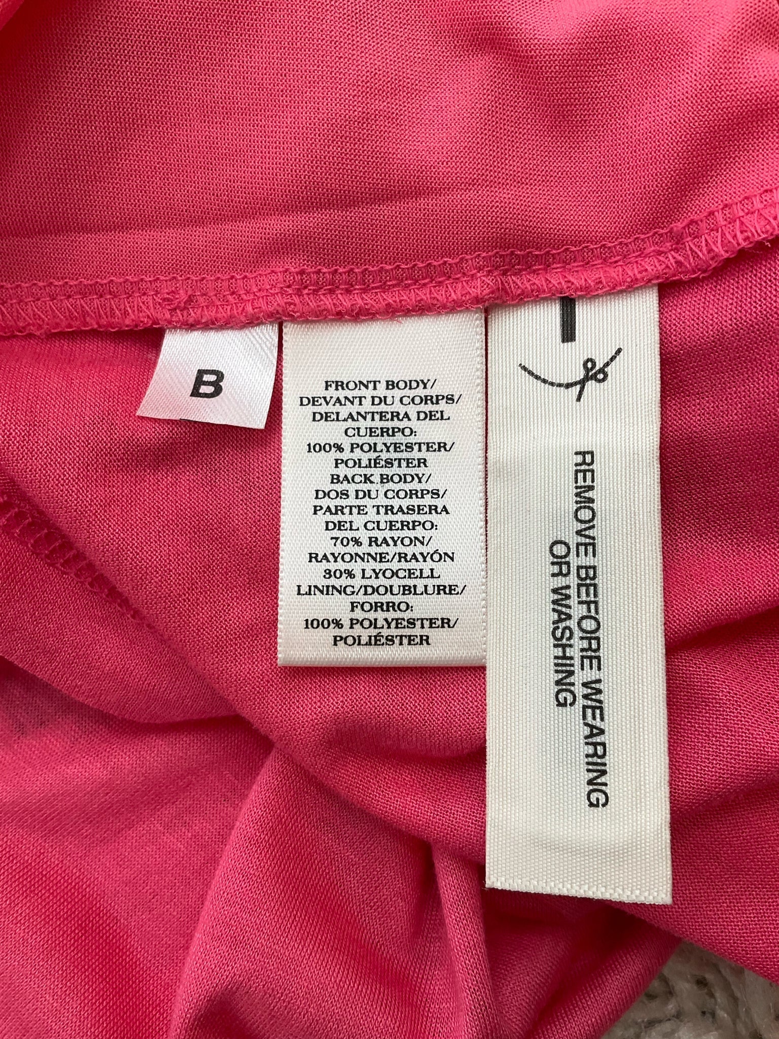 Ann Taylor pink solid sleeveless shell blouse, A-line fit, size large petite, showcasing a mixed media design.