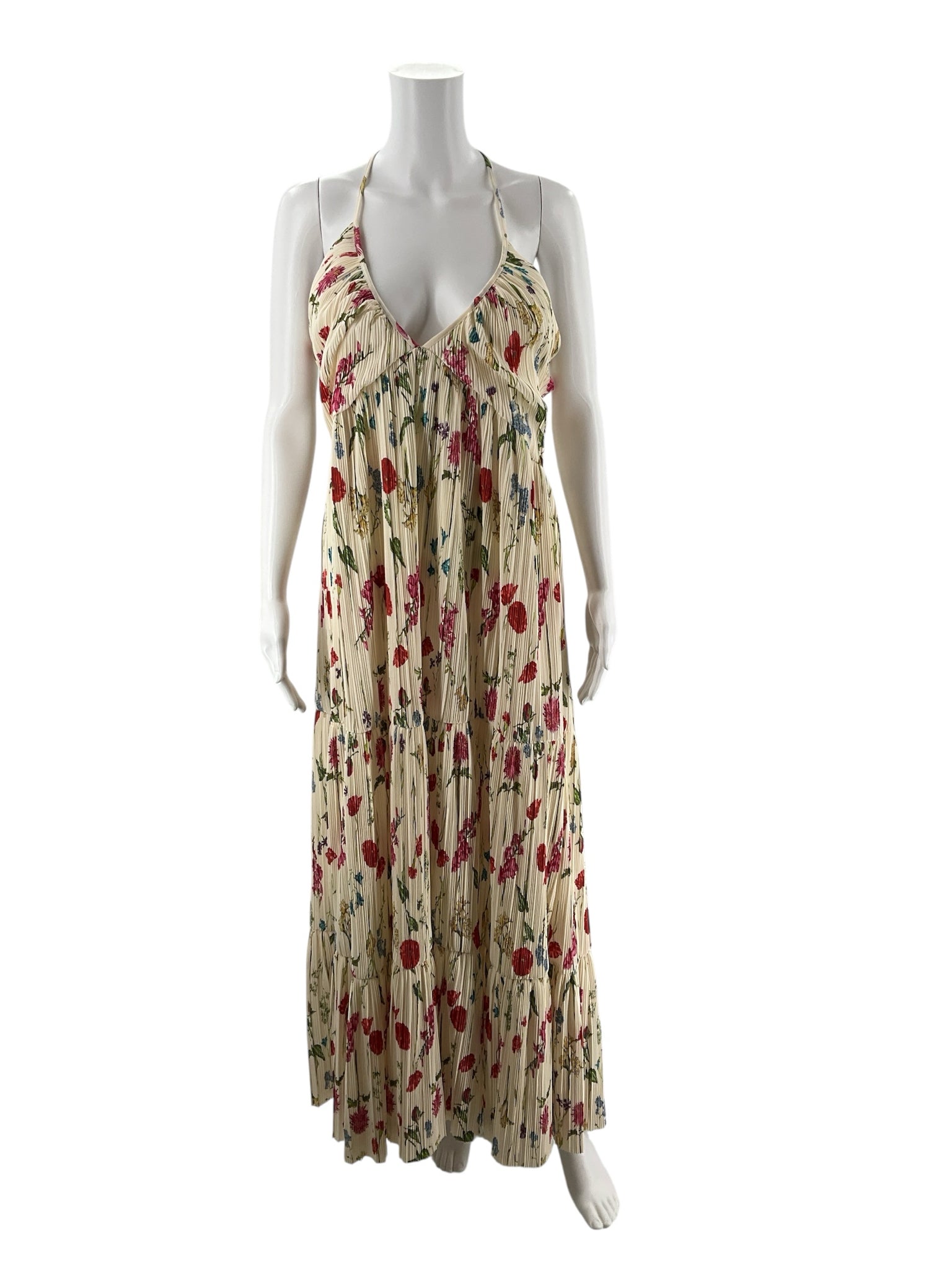 H&M cream floral maxi dress with halter neck, pleated skirt, empire waist, and open back in size large.