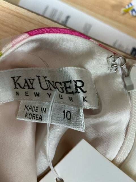 Brand and size label of Kay Unger White/Green/Pink Print Pre-Owned Ladies Dress - Size 10, made in Korea, confirming authenticity and sizing.