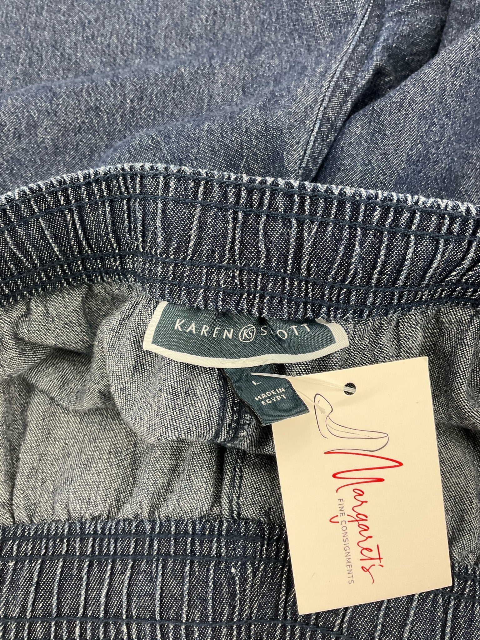 Karen Scott blue denim pull-on ladies shorts in chambray, relaxed fit, size large, displayed on a neutral background.