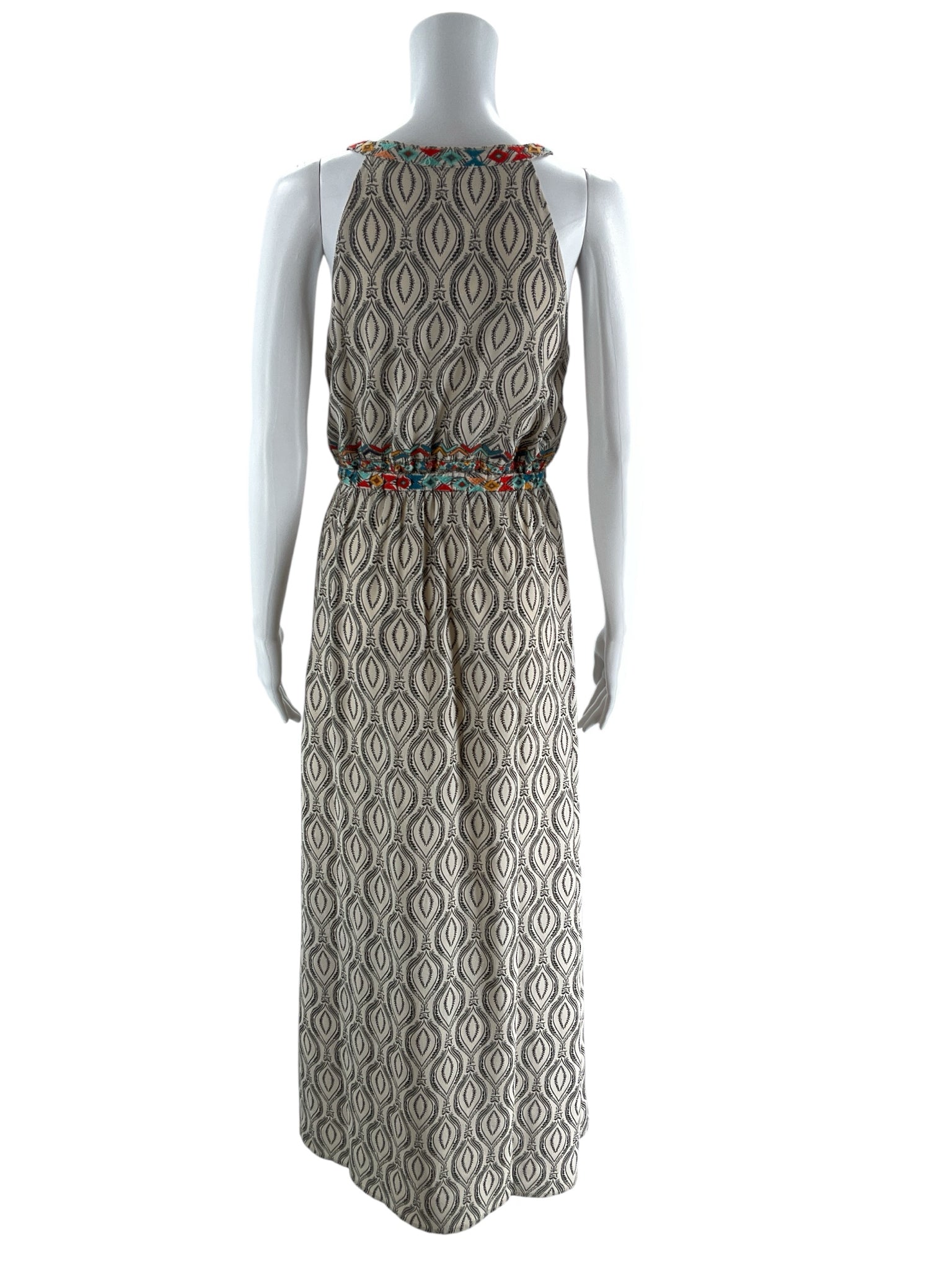THML tan and black print sleeveless maxi dress in size small, featuring a bohemian style perfect for resort wear.