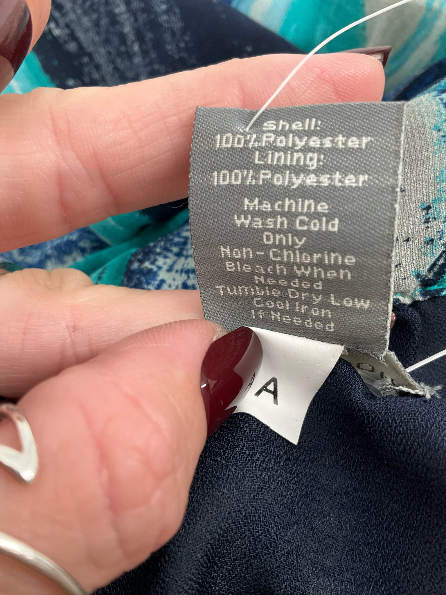 Ann Taylor Navy/Turquoise Print Pre-Owned Ladies Top - Size 6 - Margaret’s Fine Consignment