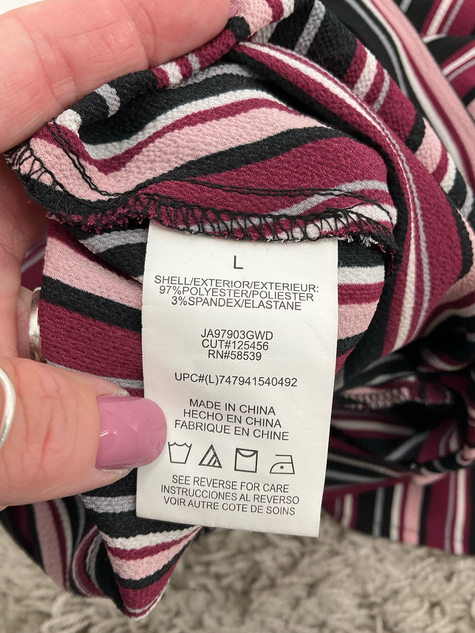 Speechless purple and black striped cropped wide leg jumpsuit, size large, featuring a stylish surplice neckline.