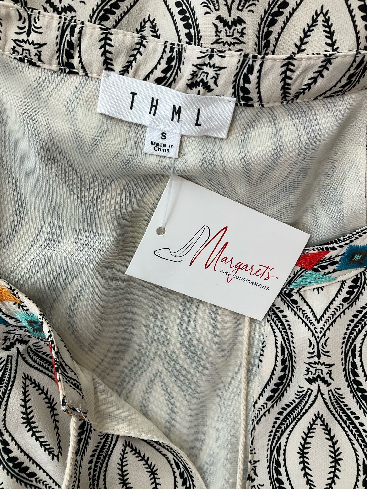 THML tan and black print sleeveless maxi dress, size small, featuring a bohemian design perfect for resort wear.