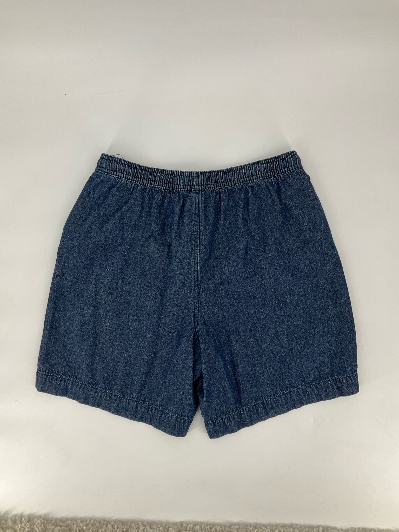 Karen Scott blue denim pull-on shorts in relaxed fit, size large, featuring chambray fabric for casual wear.