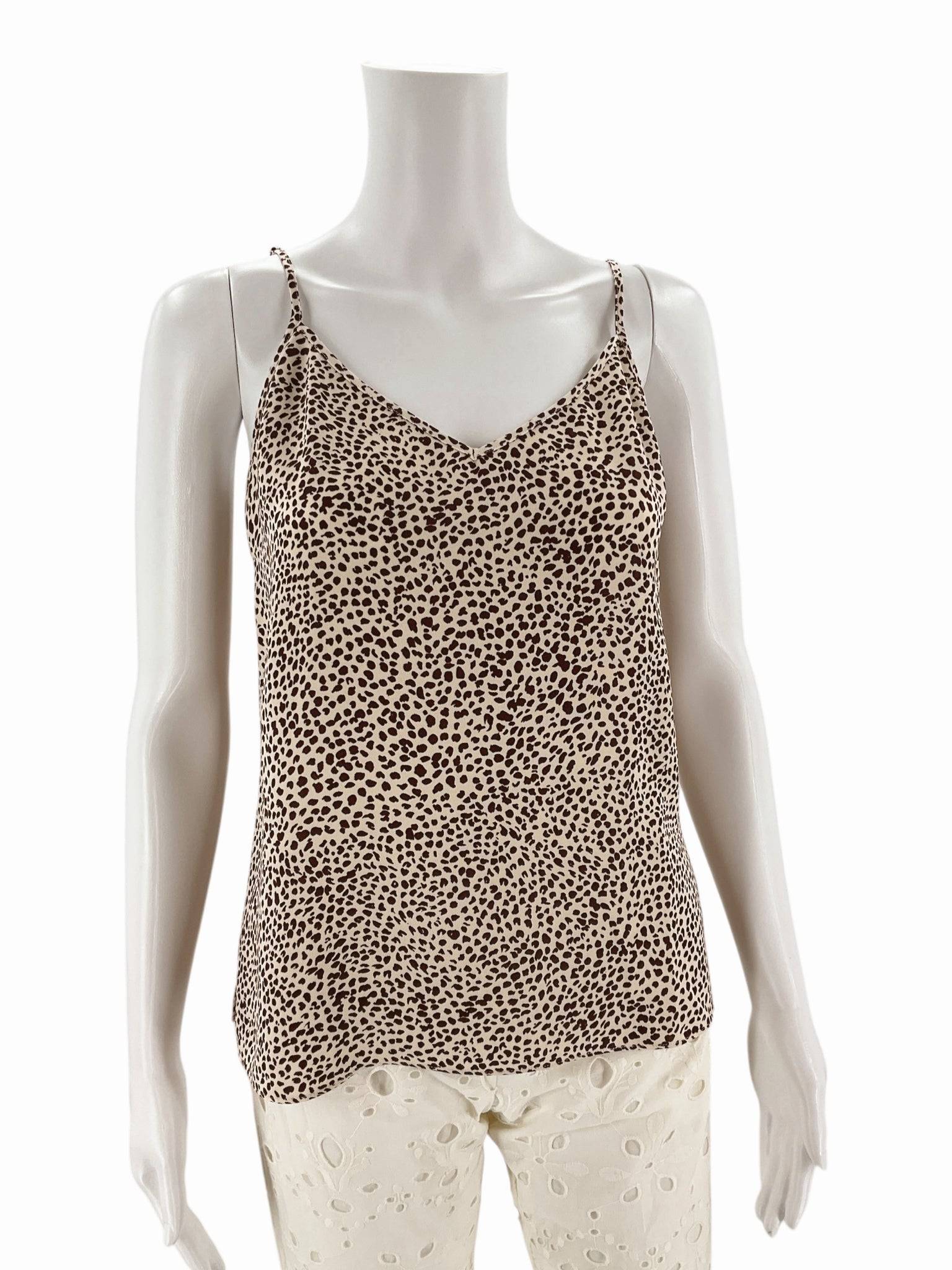 Front view of J.Crew cream and brown animal print blouse – Size XS. Gently used sleeveless top with a flattering neckline and relaxed fit.