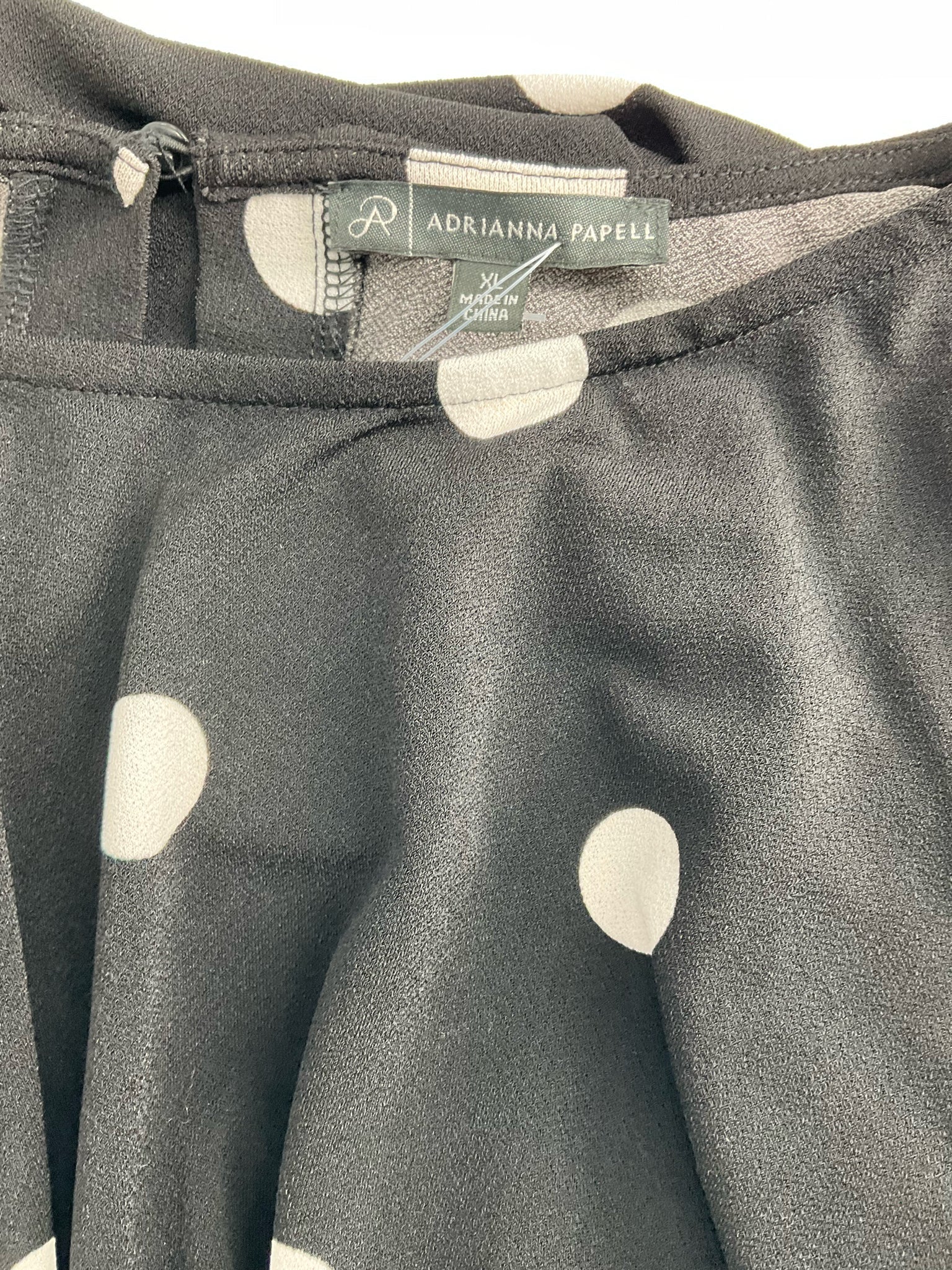 Black and white polka dot casual top by Adrianna Papell, size XL, featuring a relaxed fit and stylish design.