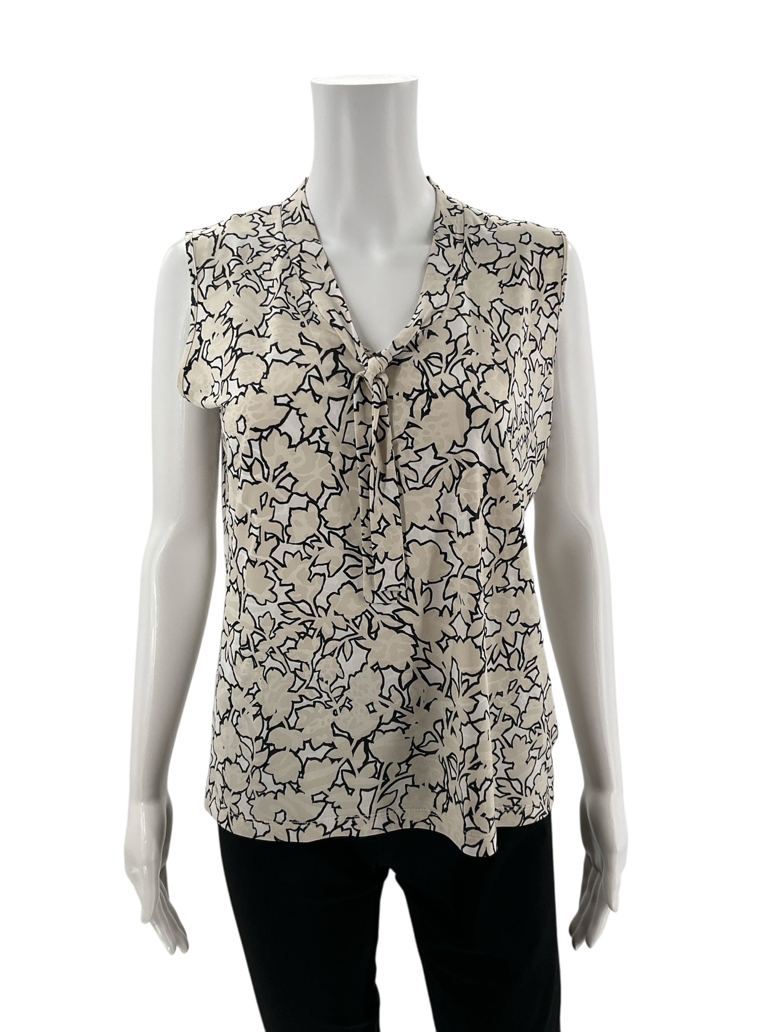 Jones New York tan and white print sleeveless tie-neck blouse, V-neck, size petite large, perfect for business casual wear.