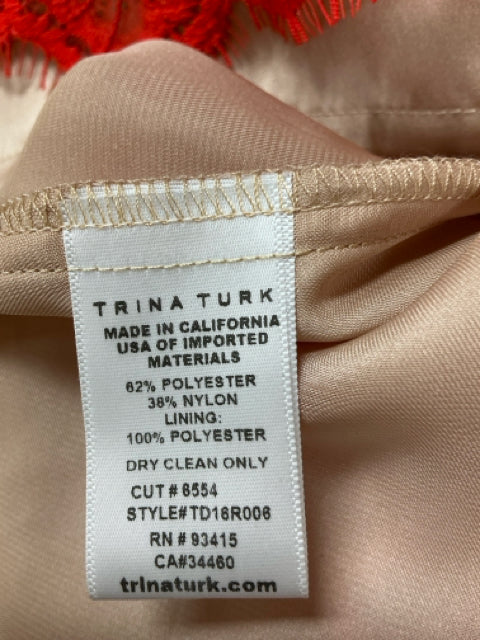 Interior label of Trina Turk dress indicating it's made in California with imported materials. Fabric content and care info included.