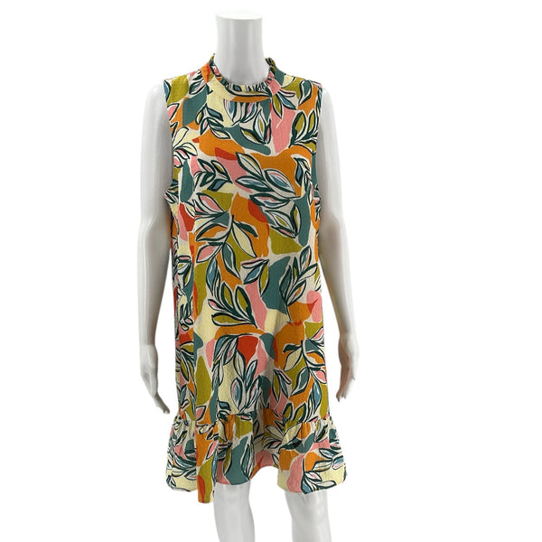 THML multicolor sleeveless dress in teal, yellow, pink, and orange leaf print, size large. Pre-owned Anthropologie style with ruffle hem.