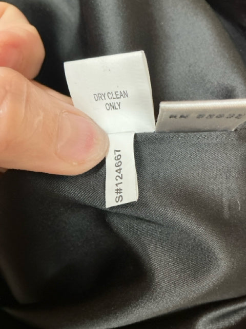 Dry clean only care label and style number S