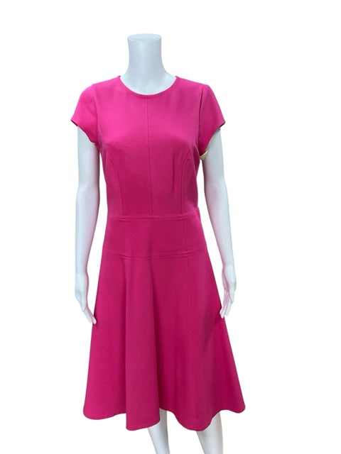Front view of Nanette Lepore Fuchsia Pink Fit & Flare Cap Sleeve Dress Size 8 on mannequin, featuring tailored seams and a flattering silhouette.