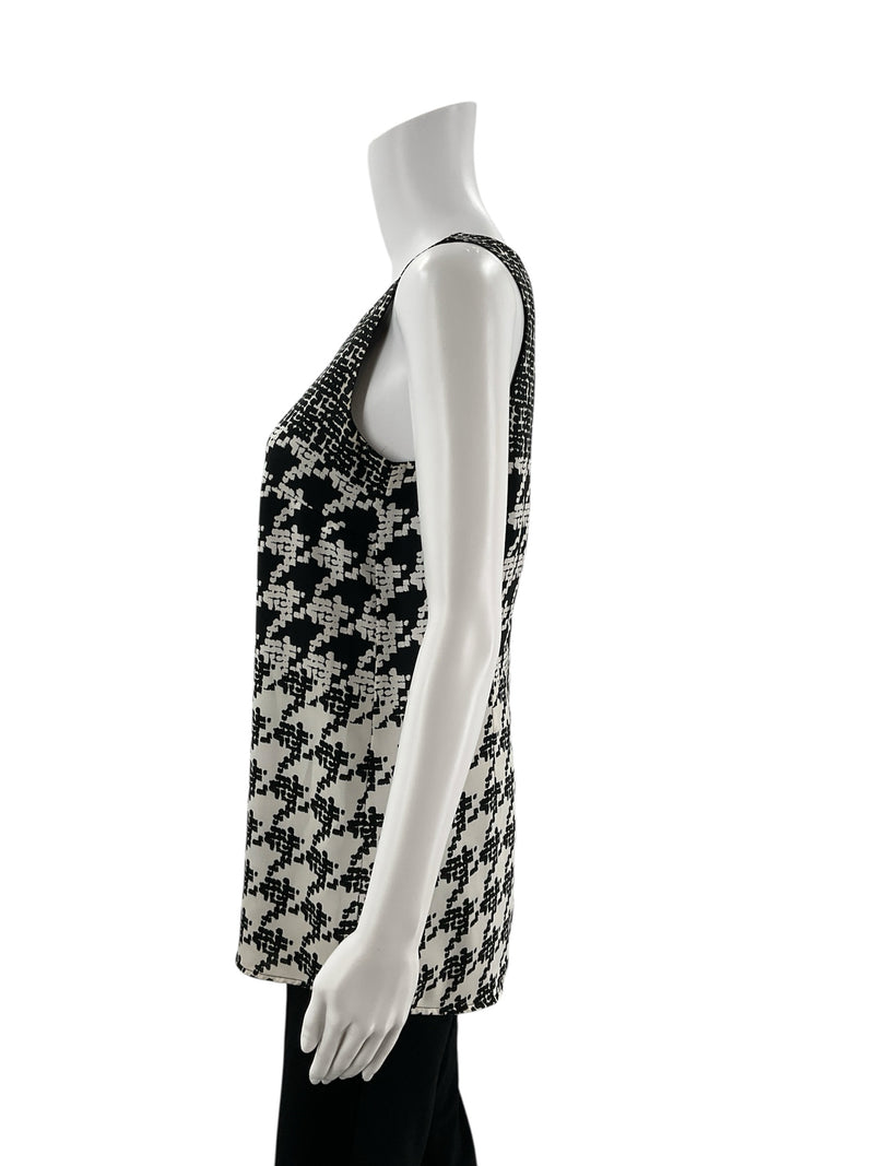 Side profile of Cabi Pixel Houndstooth Tank Top Black & White Style 3090, size XS, highlighting tunic length and sleeveless cut.