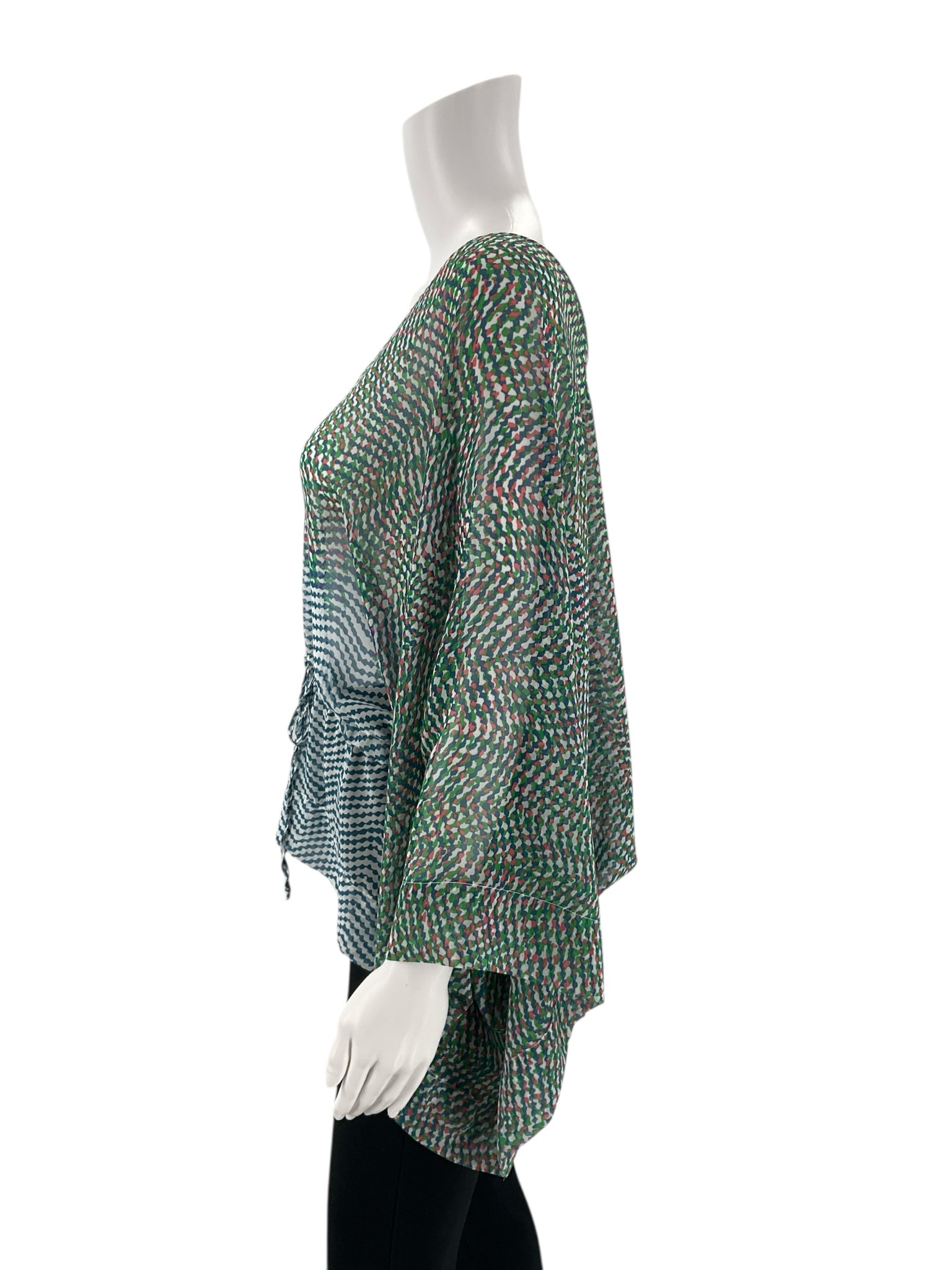 Side profile of Cabi Blue/Green/Pink Print Top - Size Medium featuring flowy silhouette and vibrant print. Casual and comfortable design.