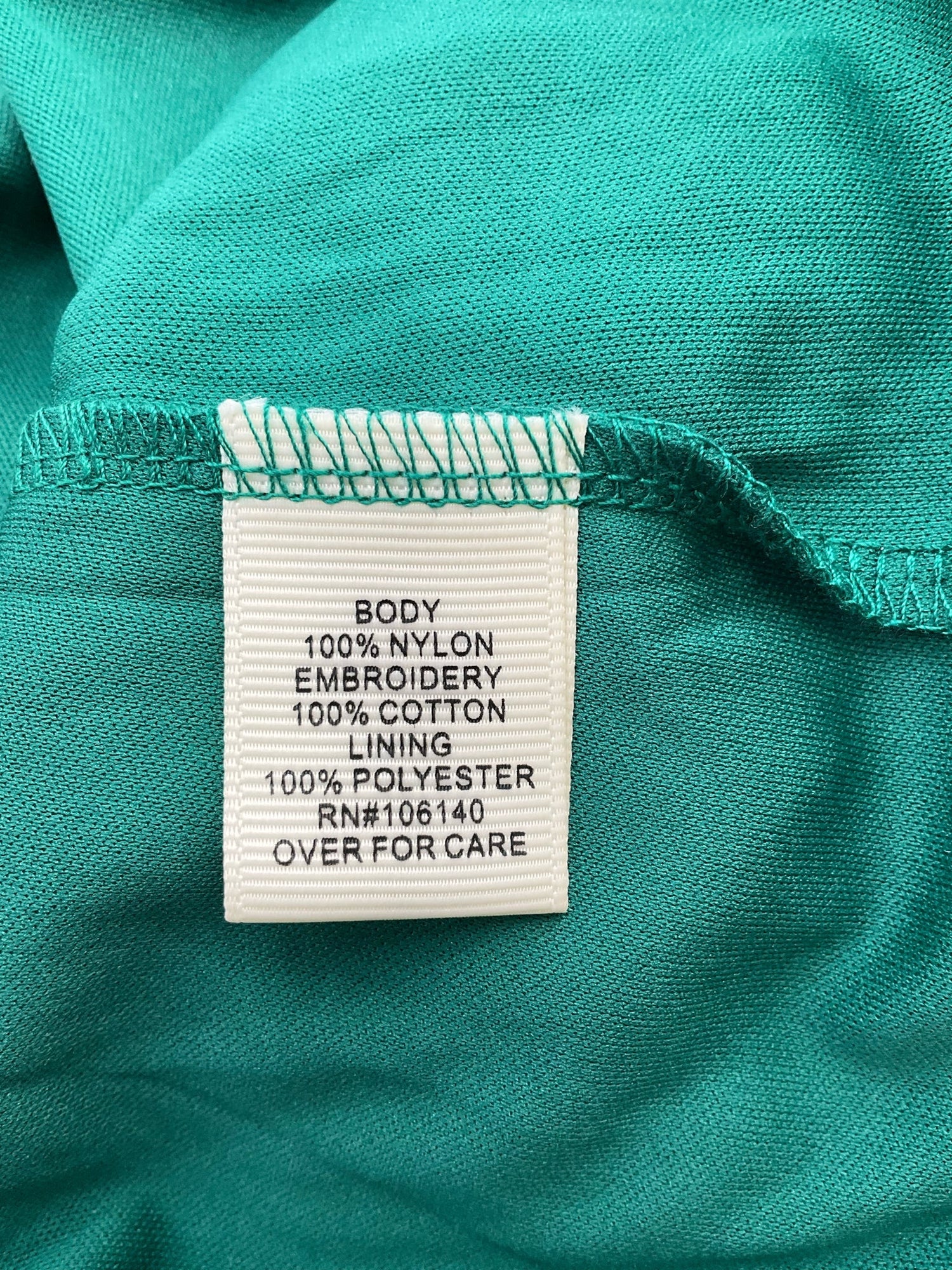 Ultra Pink green lace tunic top with bell sleeves in size medium, featuring a bohemian style and pre-owned condition.