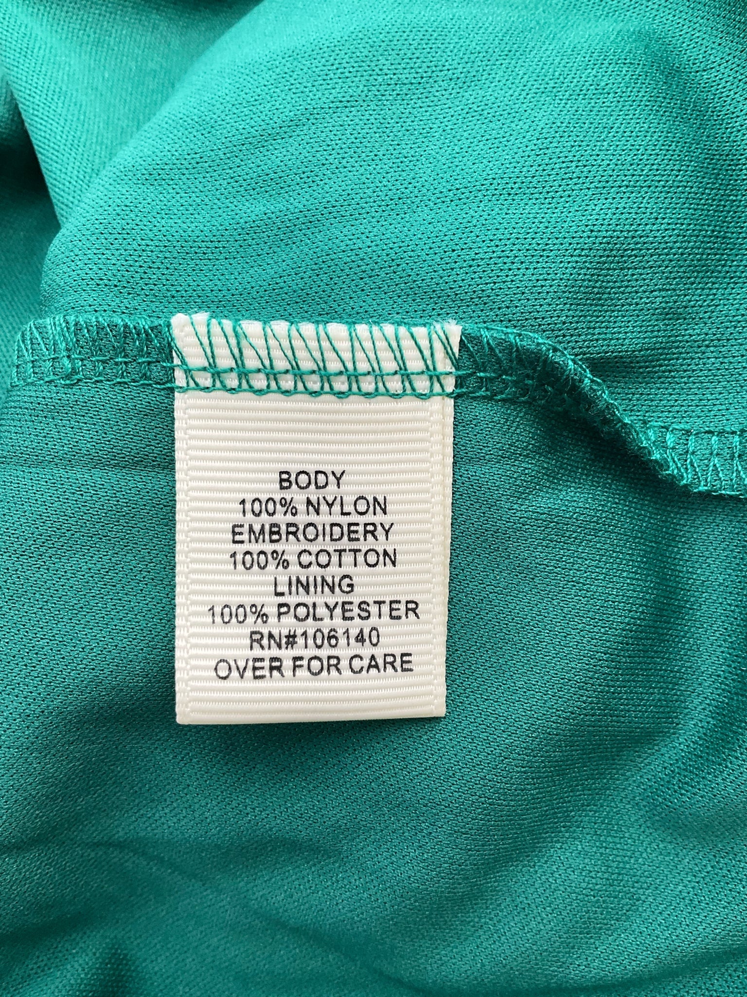 Ultra Pink green lace tunic top with bell sleeves in size medium, featuring a bohemian style and pre-owned condition.