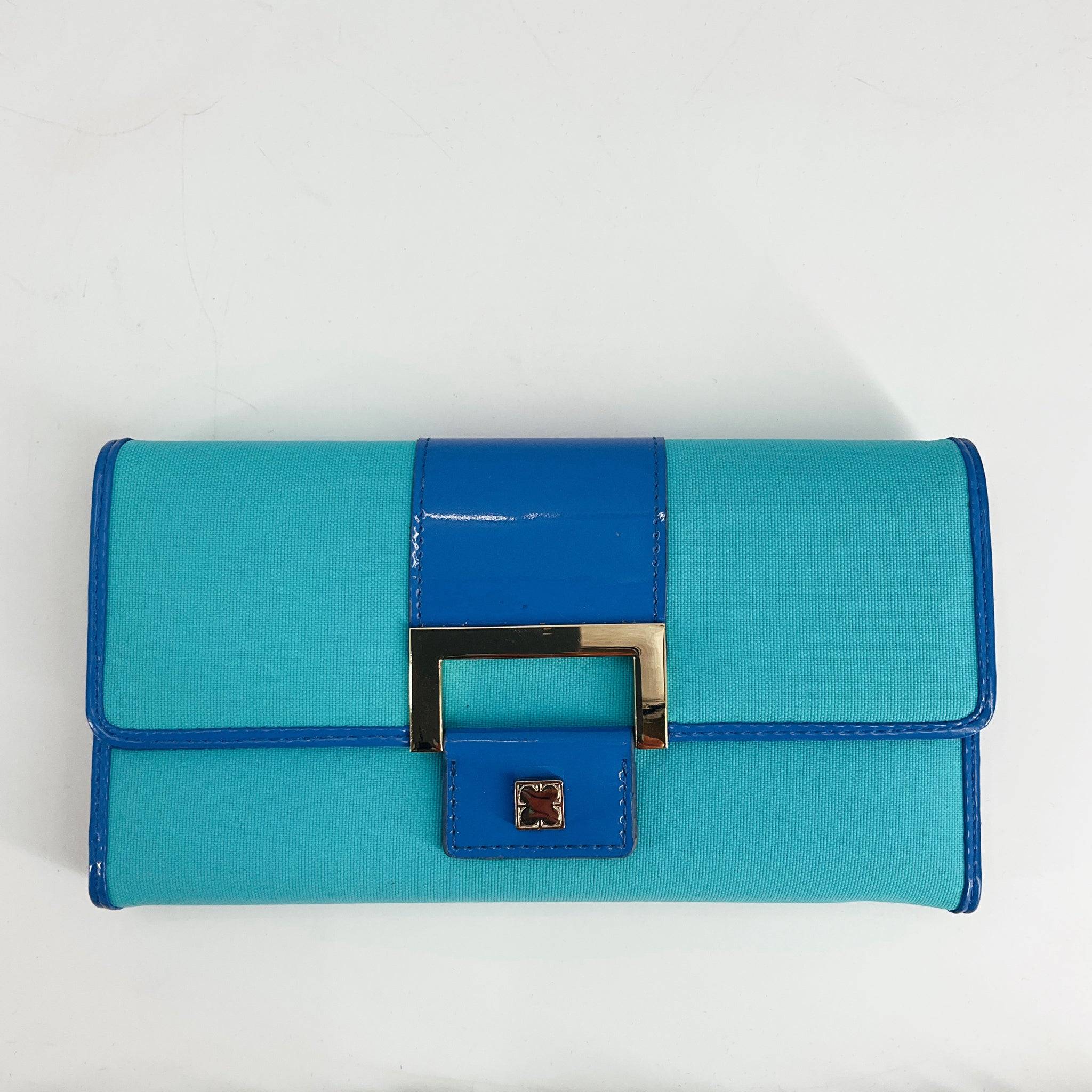Liz Claiborne Blue Solid Pre-Owned Wallet with gold-tone buckle and glossy trim, available at Margaret's, Gently Used. Stylish and functional design.