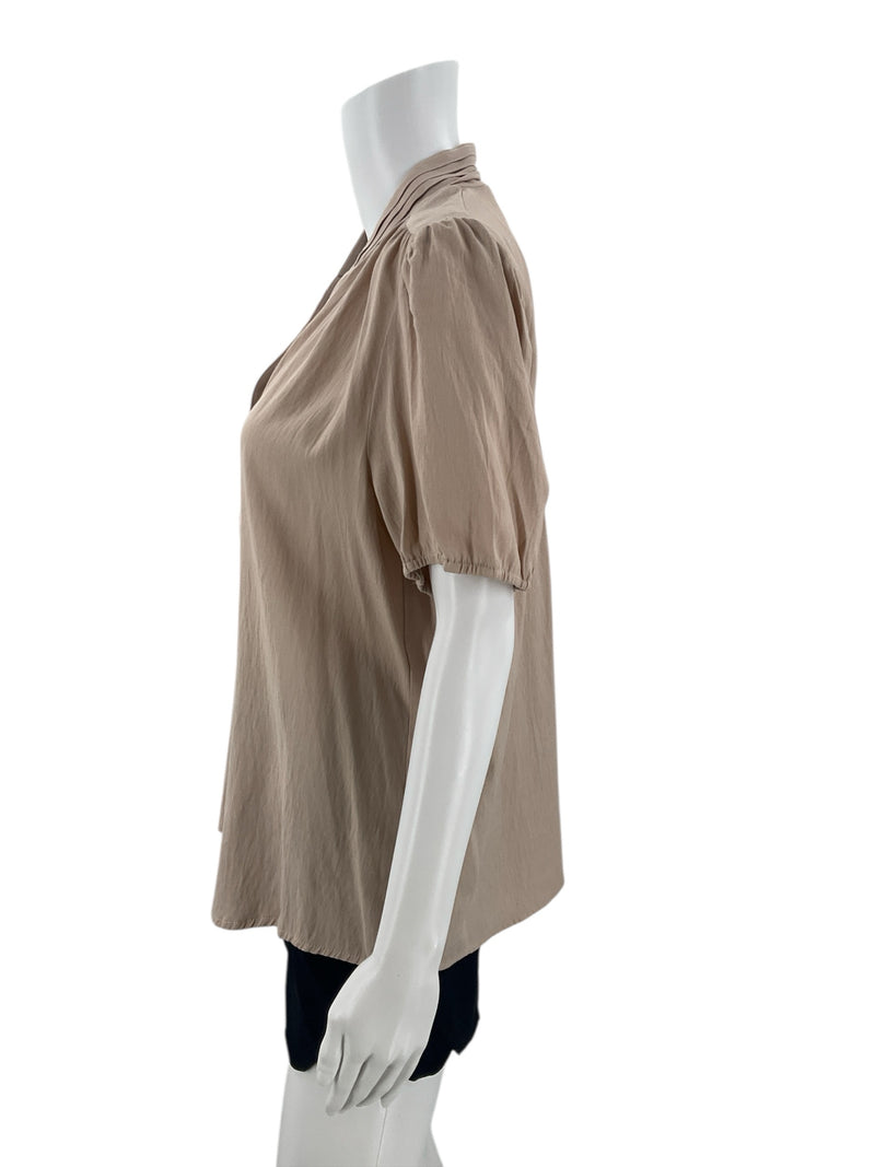 Side profile of Fun2Fun Tan Casual Top, Size Large, featuring puff sleeves and soft drape for everyday comfort.
