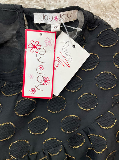 Pre-owned Joy Joy ladies top in black with gold dots, size XS, featuring a stylish and trendy design.