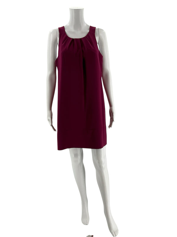 Front view of Oleg Cassini plum sheath dress size 6 on mannequin, showcasing pleated neckline and shift silhouette for weddings or professional events.