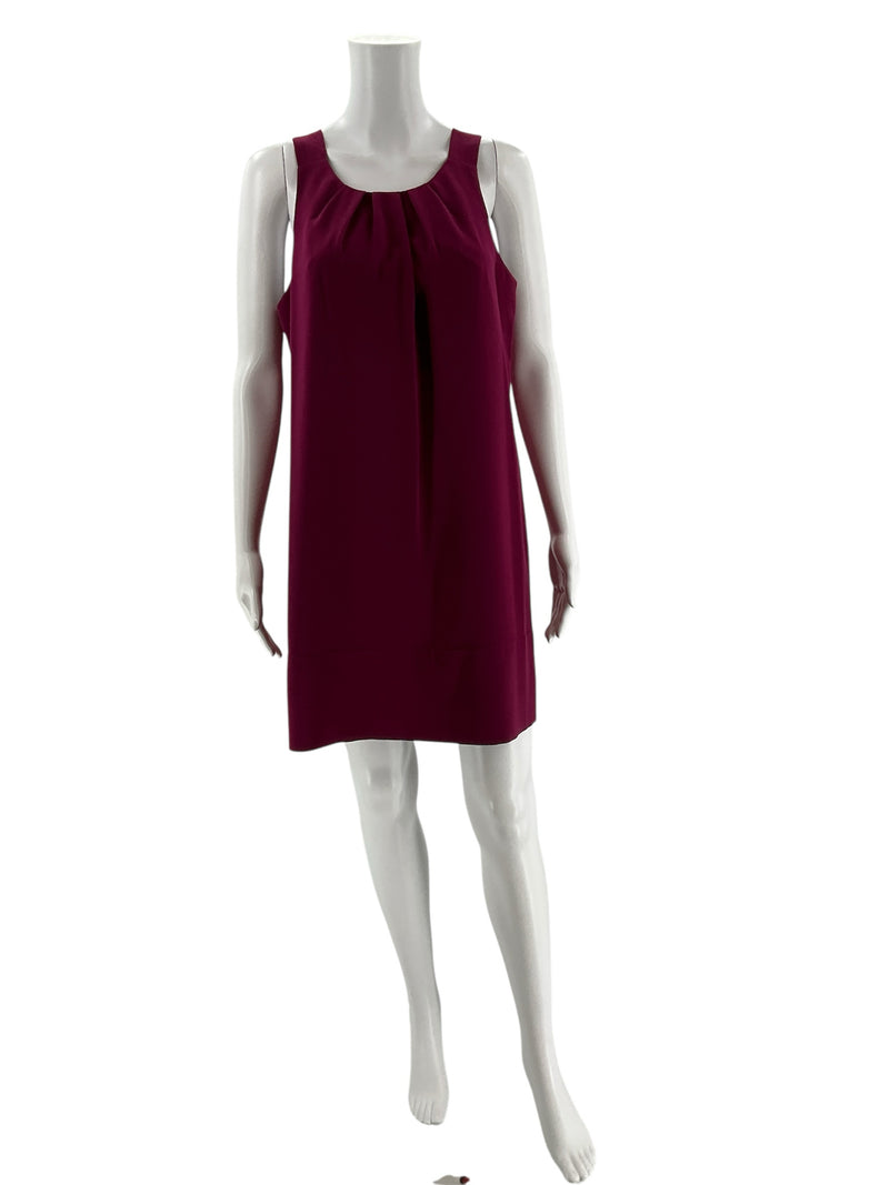 Front view of Oleg Cassini plum sheath dress size 6 on mannequin, showcasing pleated neckline and shift silhouette for weddings or professional events.