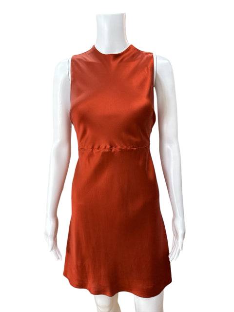 Front view of Banana Republic Sleeveless Mini Dress Size 6P in rust silk, featuring a simple, elegant design ideal for petite women.