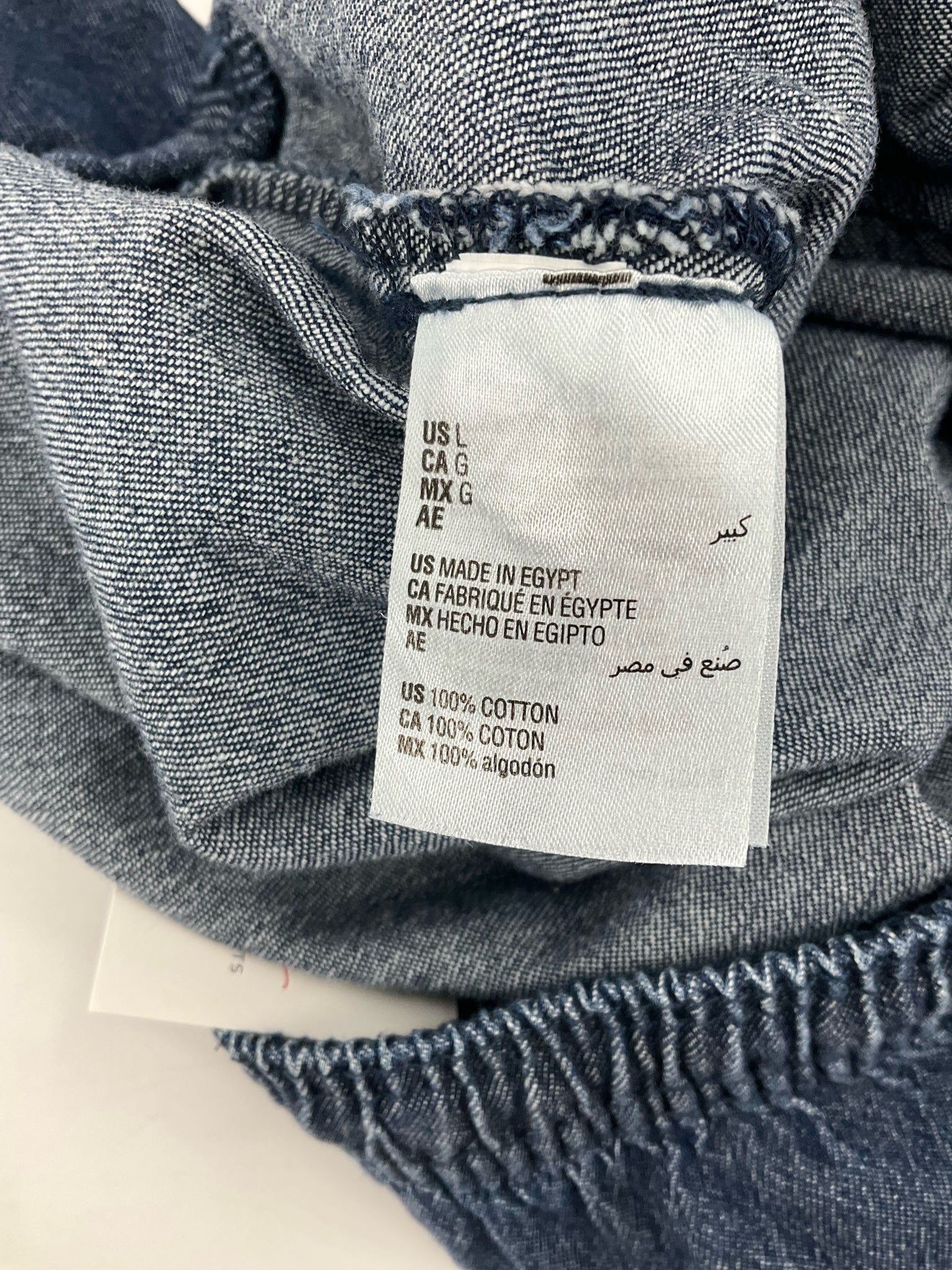 Karen Scott blue denim pull-on shorts in relaxed fit, size large, featuring a casual chambray style for women.