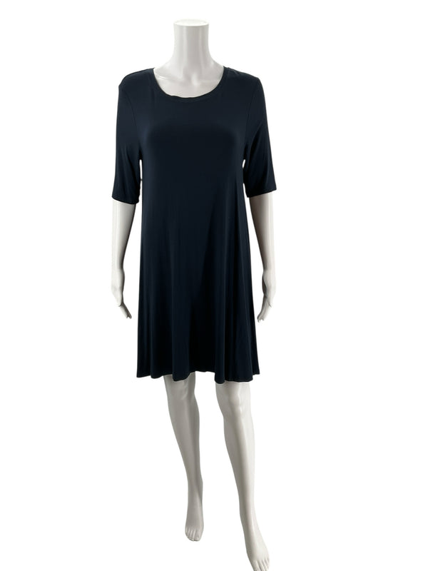 Front view of C&C California navy blue t-shirt swing dress on mannequin, showcasing scoop neck and relaxed A-line silhouette.