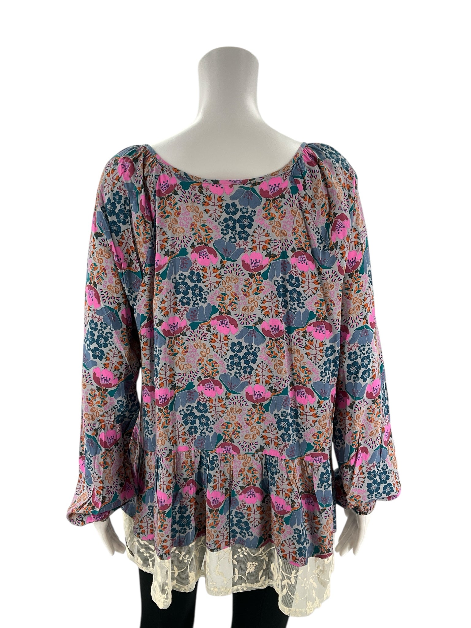 Back view of Matilda Jane Blue/Multi Floral Top - Size Medium showcasing vibrant floral print and flowy silhouette, perfect for relaxed styling.