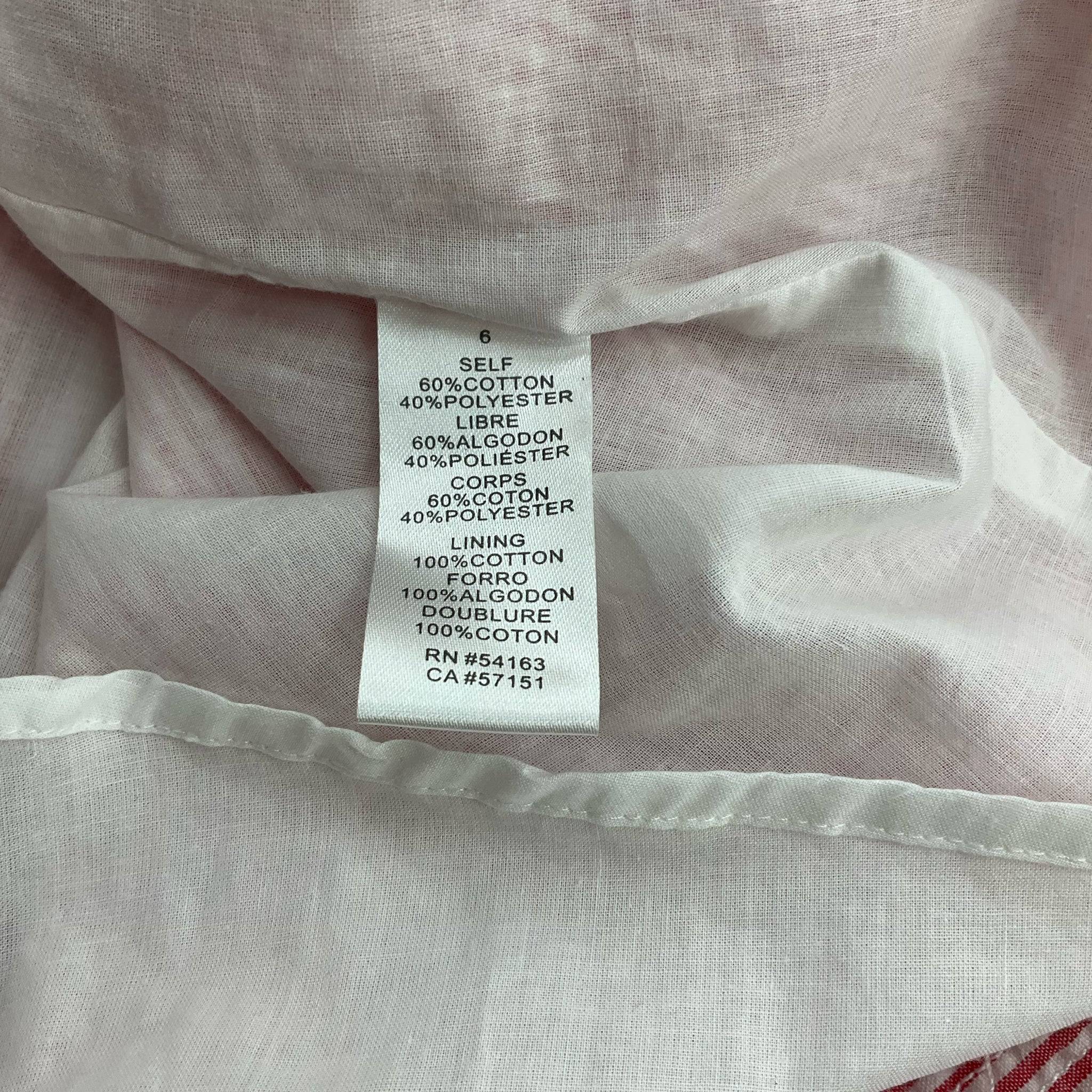 Fabric content label of Jessica Simpson dress size 6, listing cotton and polyester blend for shell and lining, ensuring breathable comfort.