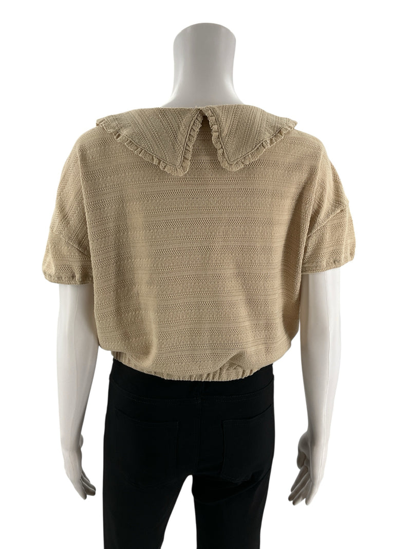 Back view of Madewell tan Peter Pan collar cardigan sweater with scalloped trim. Lightweight knit, perfect for casual or light academia looks.