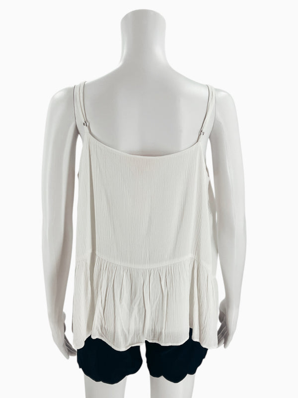 Back view of Lilly Pulitzer white sleeveless top, size large, featuring a relaxed fit and lightweight rayon fabric. Sustainable pre-owned fashion choice.