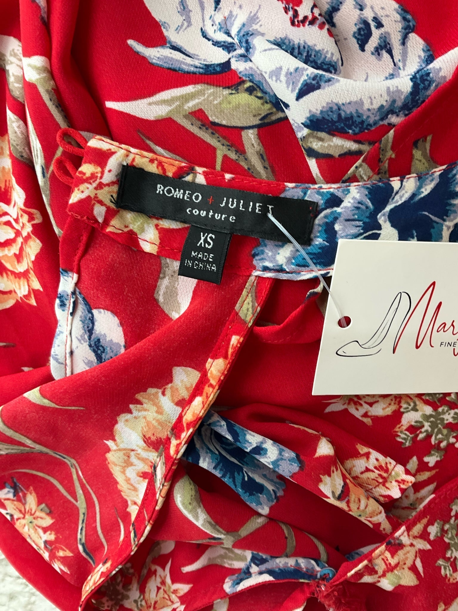 Romeo &amp; Juliet Coral/Multi Floral Pre-Owned Ladies Jumpsuit - Size XS - Margaret’s Fine Consignment