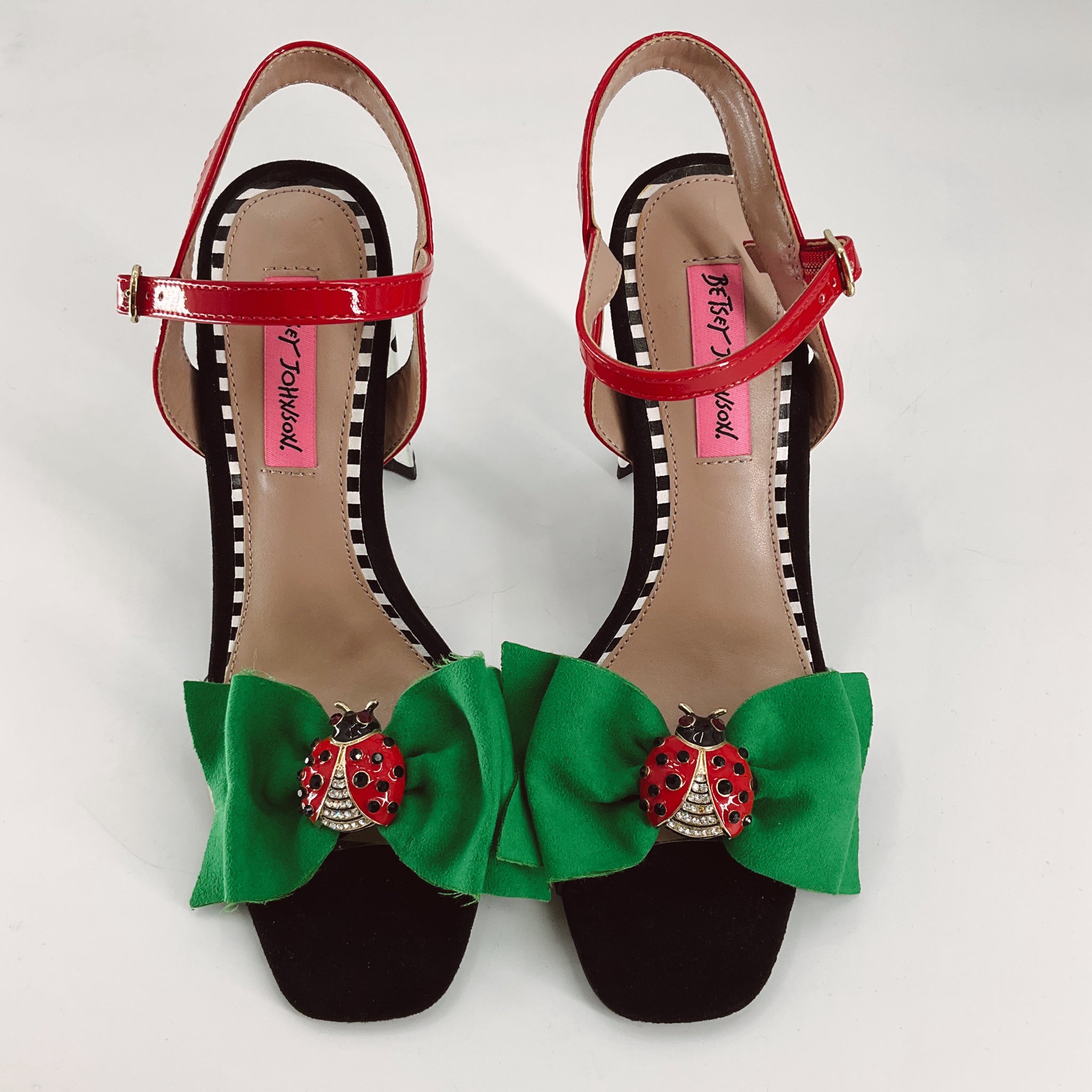 Front view of Betsey Johnson Black/White Ladybugs Heel - Size 7.5 showing open toe design, green bows, and red ladybug accents on black base.