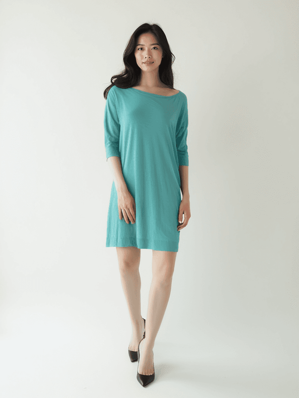 Lilly Pulitzer Dress Size Small in aqua modeled with 3/4 sleeves and relaxed fit, available at Margaret's Fine Consignments.