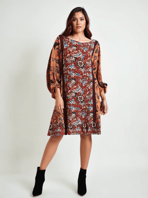 Matilda Jane Dress Size Medium with maroon floral print and boat neck, modeled with black ankle boots. Available at Margaret’s Fine Consignments.