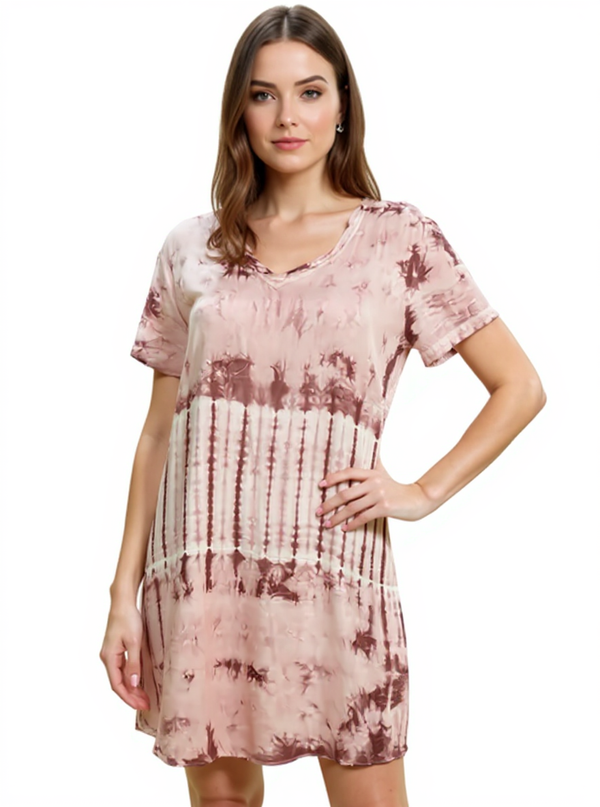 Velvet Heart Pink Tye Dye Pre-Owned Ladies Dress in size XS modeled, featuring a V-neck, short sleeves, and high-low hem in soft rayon fabric.