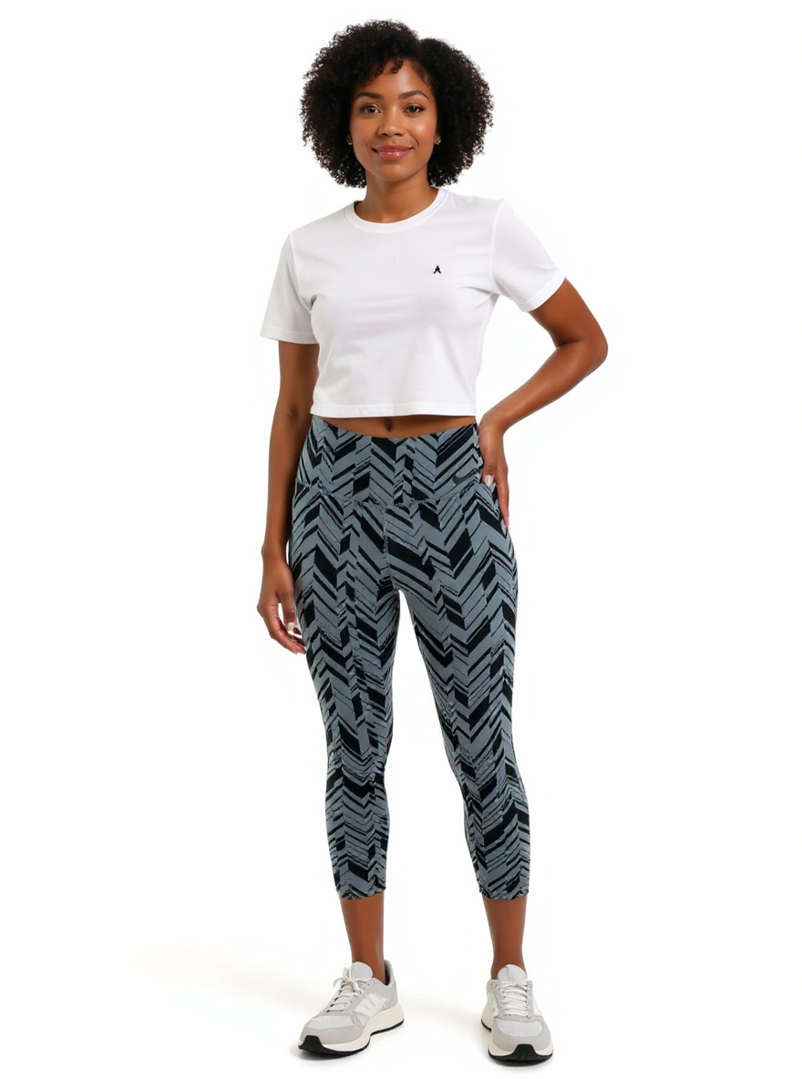 Nike blue and navy print ladies activewear pants in size small, featuring a comfortable fit and stylish design.