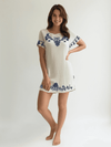 Lulus white and blue embroidered crew neck mini dress size small, modeled for Margaret’s Fine Consignments casual collection.