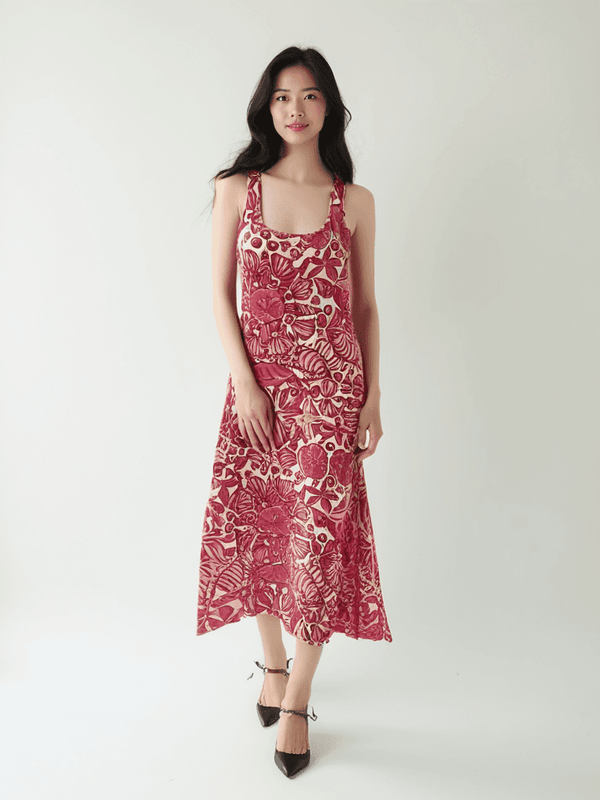 Model wearing Lilly Pulitzer Dress Size Small in white and pink shell print, available at Margaret’s Fine Consignments. Lightweight and breezy maxi style.