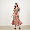 Maxi Dress Medium-Colorful Sustainable with multi-color print in pink, orange, teal, and white, modeled for casual eco-friendly fashion.