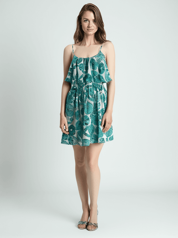 Lilly Pulitzer Dress Size Petite Small modeled in white and teal with floral print and ruffle neckline, available at Margaret's Fine Consignments