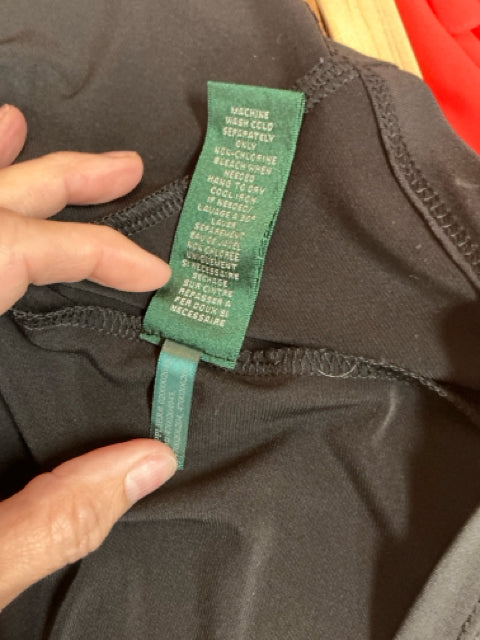 Care label for Ralph Lauren Black/White Animal Print Dress, indicating machine wash cold and fabric composition details.