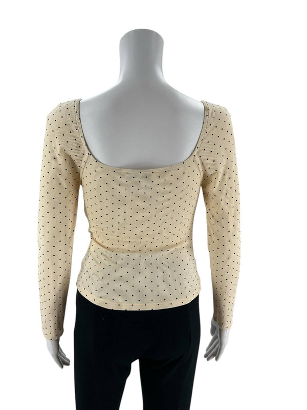 Back view of Rihoas Cream/Black Polka Dot top in size XS, showcasing scoop neckline and fitted silhouette. Ideal for chic, vintage-inspired wardrobes.