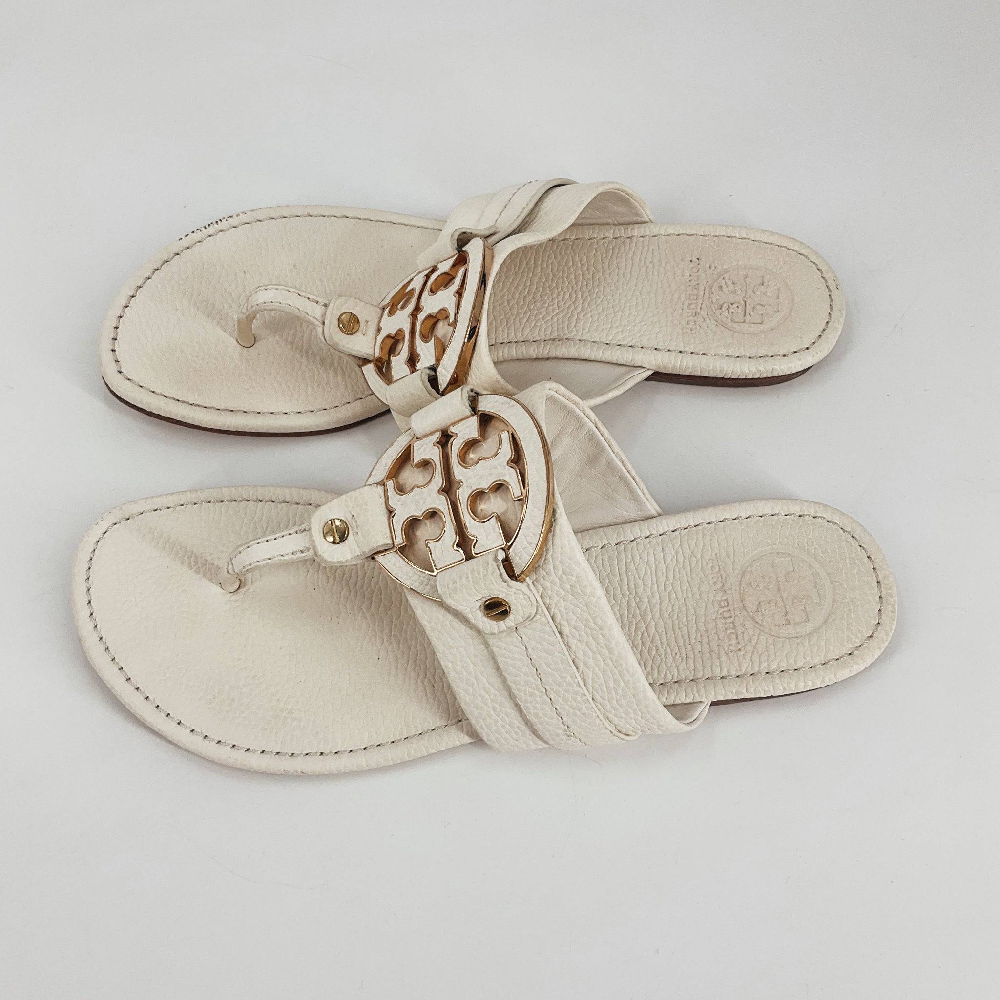 Tory Burch Size 10 off white flip flops sandals with gold logo medallion and textured leather straps, pre-owned women's footwear.