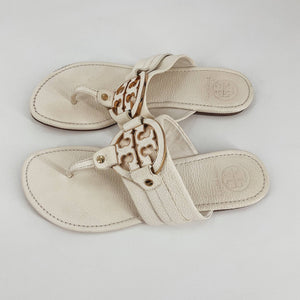 Tory Burch Size 10 off white flip flops sandals with gold logo medallion and textured leather straps, pre-owned women's footwear.