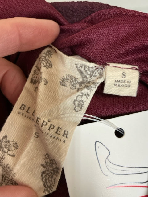 Brand and size tag of Blu Pepper Maroon Floral Pre-Owned Ladies Dress - Size Small, indicating it's made in Mexico and designed in California.