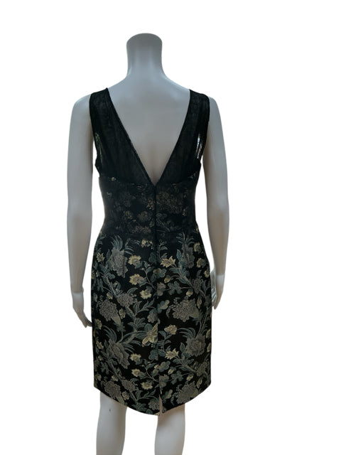 Back view of Kay Unger New York black floral brocade cocktail dress with deep V-back and center zipper, ideal for evening events.