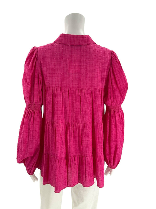 Back view of Joy Joy Pink Solid Pre-Owned Top - Size Small showing gathered tiers and long puff sleeves, ideal for versatile styling.